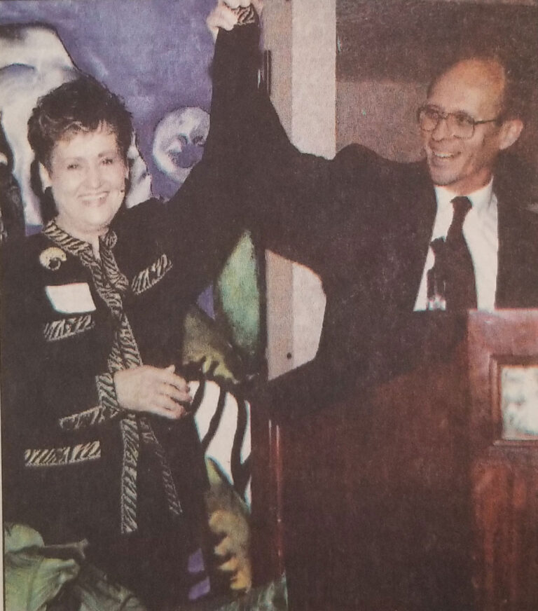 2000 January, The moment Helen Stairs learns the Theater is being named after her. David Scott at the podium. Photo by Arch Boothe for the Sanford Herald